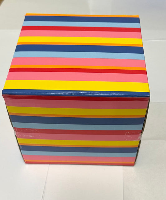 Ephemera, vintage items, collage items in a colorful 6" x 6" box