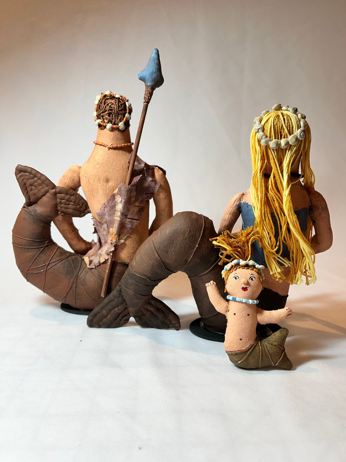 Art doll. Folk art style. Merfolk family. blond haired babe.