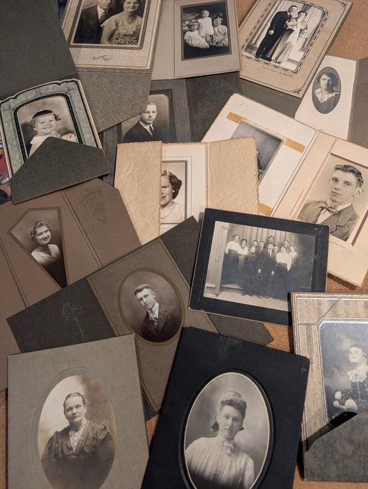 Vintage portraits in original folders