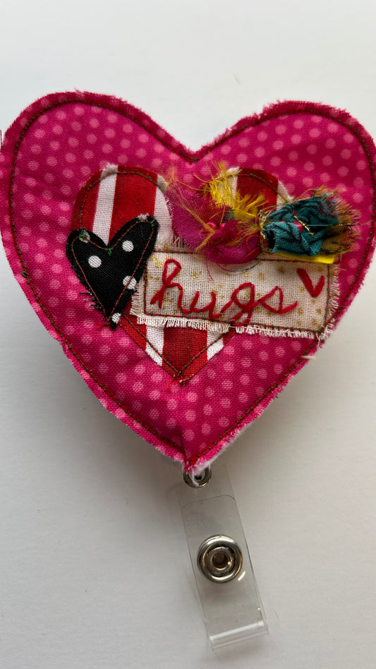 Conversation Heart- Badge Reel- “Hugs”