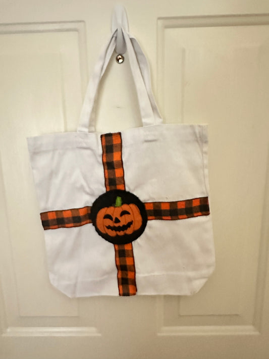 White Canvas Halloween Sack with Pumpkin Face and Checked Ribbon Trim
