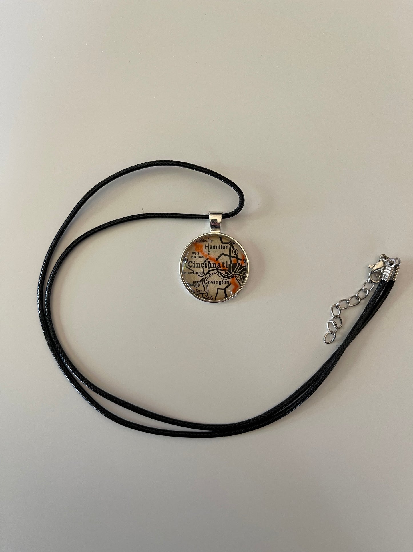 Silver Cincinnati City map pendant with black cord necklace