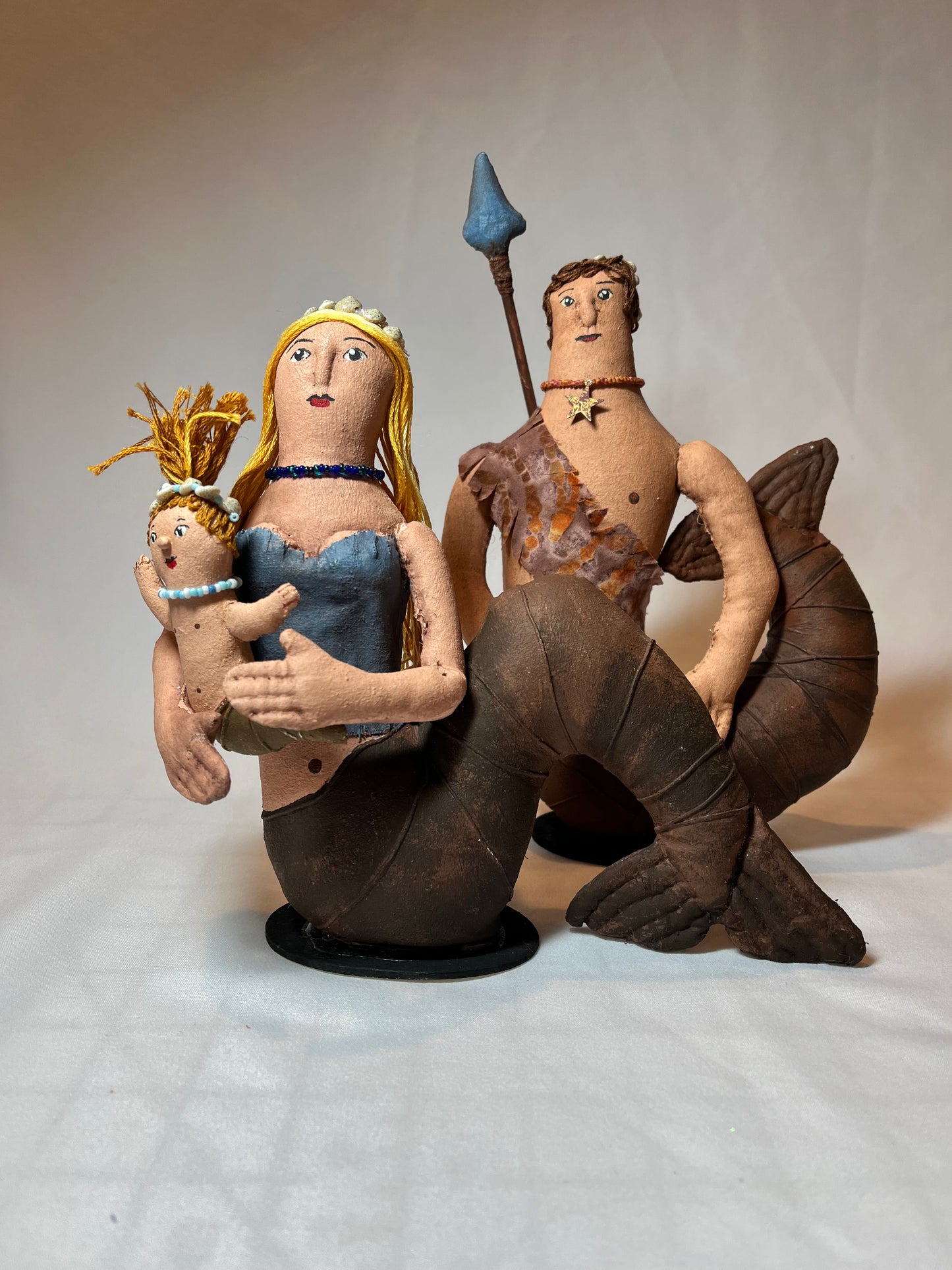 Art doll. Folk art style. Merfolk family. blond haired babe.